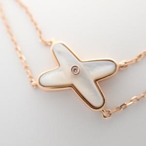 ショーメ 750PG マザーオブパール ジュ ドゥ リアン X クロス ダブルチェーン 最新の買取相場ご紹介