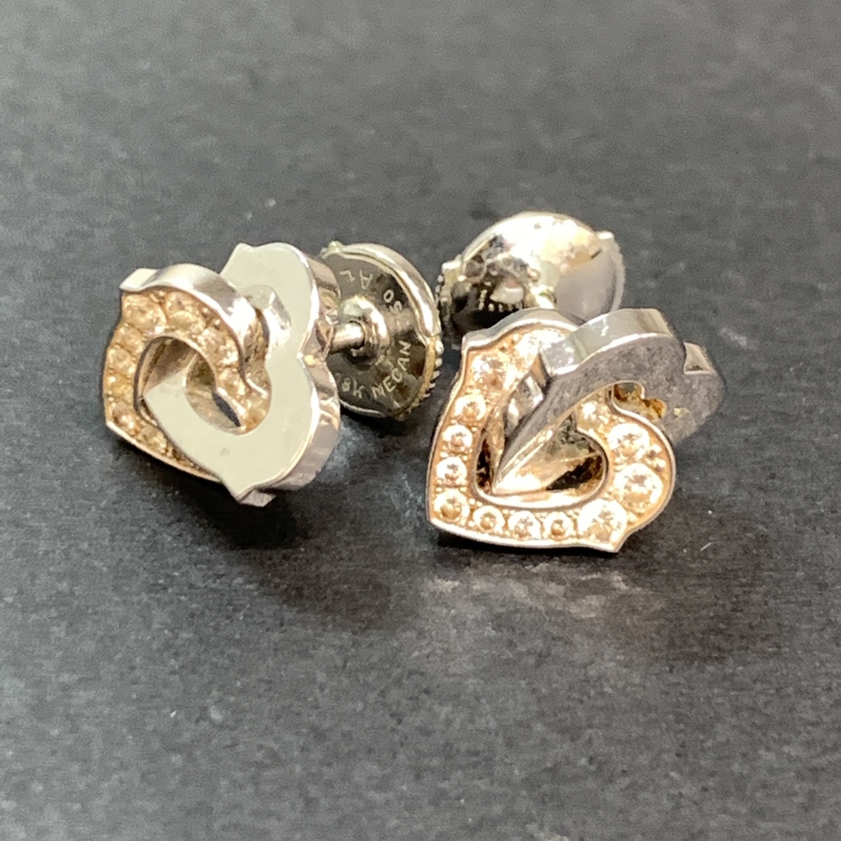 銀座本店で、カルティエの750WGのダブルハートのダイヤのピアスを 