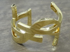 サンローランのモノグラムゴールドカフバングルの買取実績です。