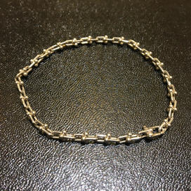 ティファニーのハードウェア マイクロリングブレスレット ミディアムの買取実績です。