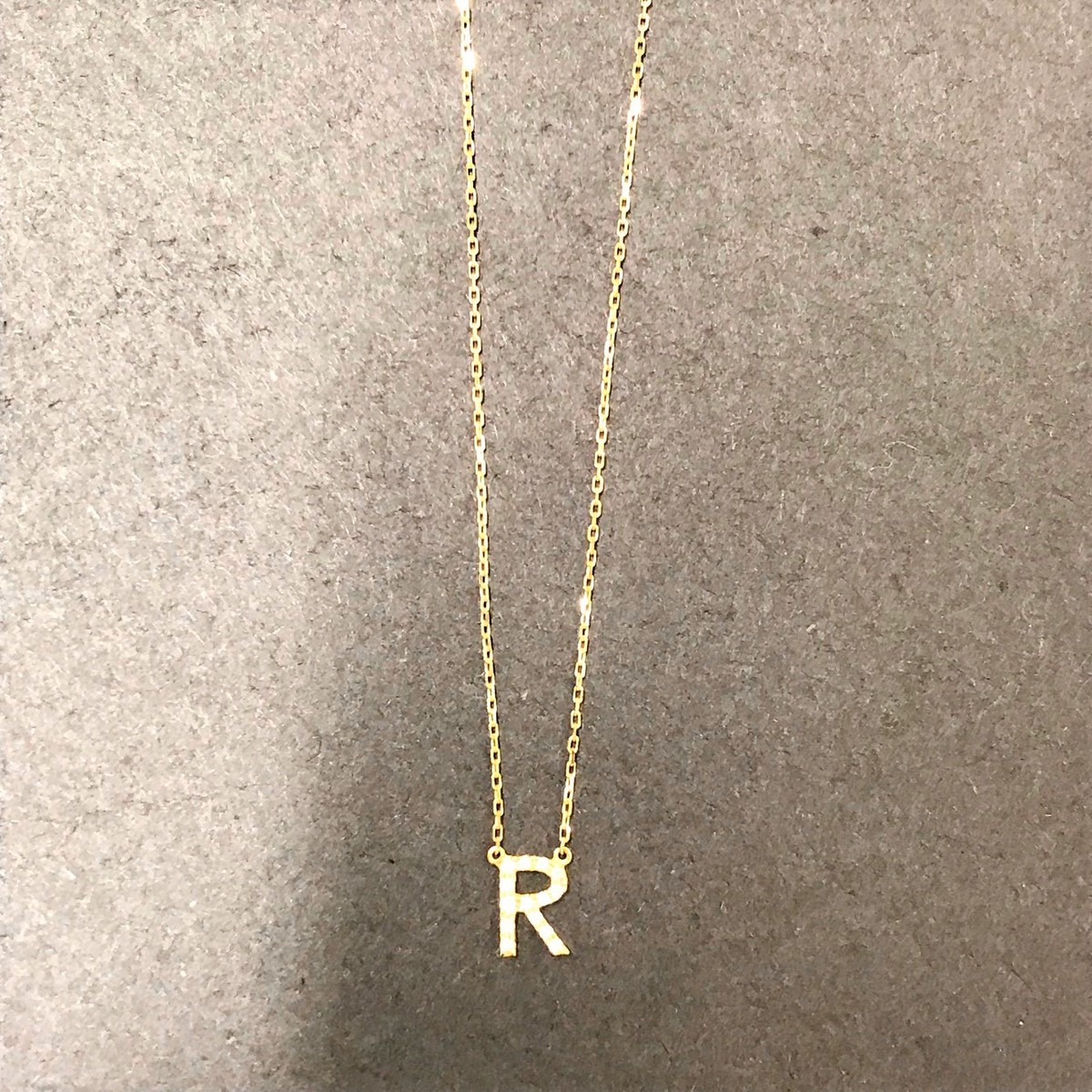 アーカーのK18 イニシャルR ネックレスを買取致しました。銀座本店です
