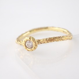 スタジオウォーターフォールのSWF　750　ダイヤ1P　ウェーブリング　1.0gの買取実績です。