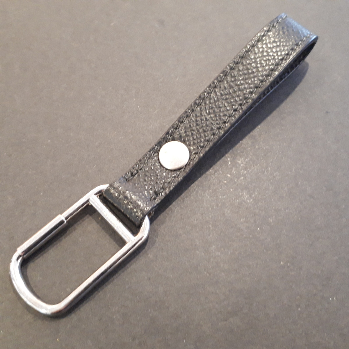 エルメスの黒 ヴォーエプソン ポルトクレループ キーリングを買取させ 