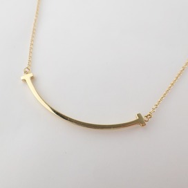 ティファニーのK18YG ティファニーT スモール スマイル ペンダントの買取実績です。