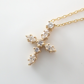 アーカーのK18YG/ダイヤモンド0.14ct NNクロス ネックレスの買取実績です。
