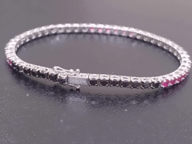 ダミアーニの750WG ルーチェ ブラックダイヤ×ルビー テニスブレスレットの買取実績です。