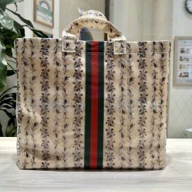 グッチの×コムデギャルソン ブラックフローラルプリント クラフトペーパーバッグの買取実績です。