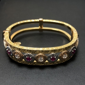 カッツァニーガのK18・750 3Pダイヤモンド×4Pルビー 特注ブレスレット ※オーダー品の買取実績です。