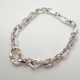 ティファニーのシルバー×K18 メイカーズ ナローチェーンブレスレット スモールの買取実績です。