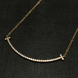 ティファニーの750YG Tスマイル スモール ダイヤネックレスの買取実績です。