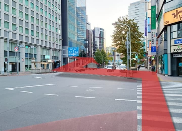 新橋駅銀座口を出て左手の新橋駅銀座口交差点を反対車線に渡って右に曲がって直進してください